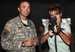 Sarah Palin with Alaska National Guard, Kuwait, 2007.  For this trip the governor had to apply for a passport.  Was it her first trip overseas? Photo: Politico.com.